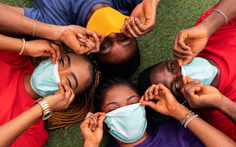high-angle-friends-with-face-mask-concept